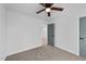 Bright bedroom with carpet flooring and ceiling fan at 2513 Rochelle St, Durham, NC 27703