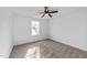 Well-lit bedroom with carpet and ceiling fan at 2513 Rochelle St, Durham, NC 27703