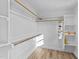 Walk-in closet with shelves and hanging rods at 2513 Rochelle St, Durham, NC 27703