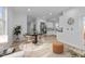 Open concept dining area with modern furnishings and hardwood floors at 2513 Rochelle St, Durham, NC 27703