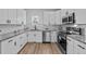 Modern kitchen featuring stainless steel appliances and granite countertops at 2513 Rochelle St, Durham, NC 27703