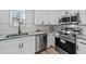 Modern kitchen with stainless steel appliances and granite countertops at 2513 Rochelle St, Durham, NC 27703