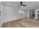 Spacious living room featuring hardwood floors and ceiling fan at 2513 Rochelle St, Durham, NC 27703