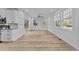 Bright living room with hardwood floors and sliding glass doors at 2513 Rochelle St, Durham, NC 27703