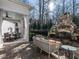 Backyard oasis with patio, fireplace, and seating area at 2900 Glenanneve Pl, Raleigh, NC 27608