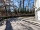 Enjoy recreational activities on this expansive basketball court next to a bright home with lush landscaping at 2900 Glenanneve Pl, Raleigh, NC 27608