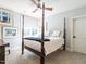 Cozy bedroom featuring a four-poster bed, soft lighting, and a calming atmosphere at 2900 Glenanneve Pl, Raleigh, NC 27608