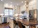 Modern kitchen with large island, stainless steel appliances, and white cabinetry at 2900 Glenanneve Pl, Raleigh, NC 27608