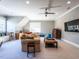 Spacious living room with neutral colored walls, a comfortable sofa, and recessed lighting at 2900 Glenanneve Pl, Raleigh, NC 27608