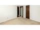 Spacious bedroom with hardwood floors and mirrored closet doors at 301 King Arthur Trl, Garner, NC 27529