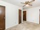 Bedroom with ceiling fan and two closets at 301 King Arthur Trl, Garner, NC 27529
