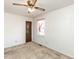 Spacious bedroom with ceiling fan and window at 301 King Arthur Trl, Garner, NC 27529