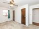 Large bedroom with ceiling fan, closet, and window at 301 King Arthur Trl, Garner, NC 27529