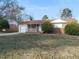 Brick ranch home with attached garage and yard at 301 King Arthur Trl, Garner, NC 27529