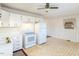Efficient kitchen with white cabinets and appliances at 301 King Arthur Trl, Garner, NC 27529