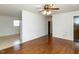 Hardwood floor living room with ceiling fan at 301 King Arthur Trl, Garner, NC 27529