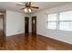 Spacious living room with hardwood floors and large windows at 301 King Arthur Trl, Garner, NC 27529