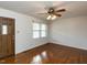 Living room featuring hardwood floors and ceiling fan at 301 King Arthur Trl, Garner, NC 27529
