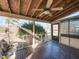 Screened porch with ceiling fan and wooden floor at 301 King Arthur Trl, Garner, NC 27529