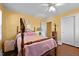 Bedroom featuring a wooden bed frame and ceiling fan at 307 E Jackson St, Mebane, NC 27302