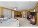Large bedroom with a queen bed, built-in closets, and ensuite access at 307 E Jackson St, Mebane, NC 27302
