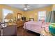 Charming bedroom with a double bed and plenty of storage at 307 E Jackson St, Mebane, NC 27302