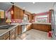 Well-equipped kitchen with ample cabinetry and a gas cooktop at 307 E Jackson St, Mebane, NC 27302