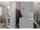 Convenient laundry room with stackable washer and dryer at 307 E Jackson St, Mebane, NC 27302