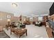 Spacious living room with fireplace, comfortable seating, and built-ins at 307 E Jackson St, Mebane, NC 27302