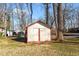 Small wooden storage shed in backyard at 307 E Jackson St, Mebane, NC 27302