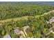 Aerial view of house and golf course at 327 Davis Love Dr, Chapel Hill, NC 27517