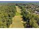 Aerial view of golf course and neighborhood at 327 Davis Love Dr, Chapel Hill, NC 27517