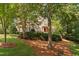 Beautiful brick home with manicured landscaping at 327 Davis Love Dr, Chapel Hill, NC 27517