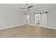 Spacious bedroom with hardwood floors, and access to the bathroom and closet at 3925 Cedar Knolls Dr, Youngsville, NC 27596