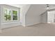 Bright bonus room with a window seat, carpeted floors, and a view of the outdoors at 3925 Cedar Knolls Dr, Youngsville, NC 27596
