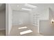 Large bonus room with skylights and built-in shelving, perfect for a playroom or office at 3925 Cedar Knolls Dr, Youngsville, NC 27596