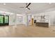Open living space with kitchen view featuring lots of natural light and a stylish modern design at 3925 Cedar Knolls Dr, Youngsville, NC 27596