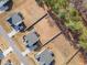 Aerial view of the property showcasing the backyard, neighboring houses, and surrounding lush landscaping at 40 Ironwood Blvd, Youngsville, NC 27596