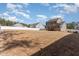 Expansive backyard with privacy fence and deck, perfect for outdoor enjoyment at 40 Ironwood Blvd, Youngsville, NC 27596