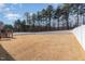 Expansive backyard with a privacy fence, deck and plenty of space for outdoor activities at 40 Ironwood Blvd, Youngsville, NC 27596