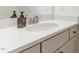 A bathroom with a sleek countertop, undermount sink, and modern fixtures offers an updated look at 40 Ironwood Blvd, Youngsville, NC 27596
