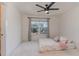 A cozy bedroom showcases a comfortable mattress and a window offering natural light at 40 Ironwood Blvd, Youngsville, NC 27596
