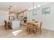 Bright open concept kitchen with an island, eat in dining and stainless steel appliances at 40 Ironwood Blvd, Youngsville, NC 27596