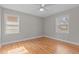 Hardwood floor bedroom with two windows at 416 N Cheatham St, Franklinton, NC 27525
