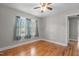 Hardwood floor bedroom with window and closet at 416 N Cheatham St, Franklinton, NC 27525