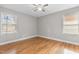 Bright bedroom with hardwood floors and neutral walls at 416 N Cheatham St, Franklinton, NC 27525