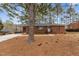Brick ranch house with a large front yard and mature trees at 416 N Cheatham St, Franklinton, NC 27525