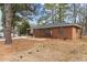 Front view of brick ranch house with walkway and landscaping at 416 N Cheatham St, Franklinton, NC 27525