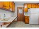 Knotty pine cabinets and built-in counter space at 416 N Cheatham St, Franklinton, NC 27525