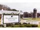 Fearrington Village sign at the entrance, highlighting the shops, inn, spa and restaurants at 4201 Henderson Pl, Pittsboro, NC 27312